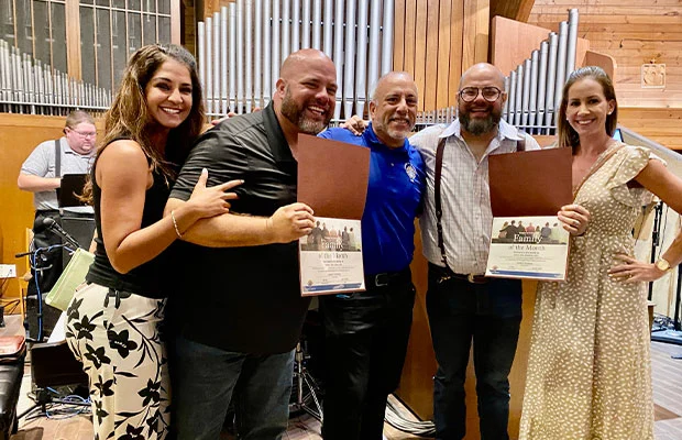 Knights of Columbus honoring a family, exemplifying unity, protection, and mutual support.